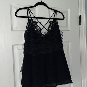 Lacey black tank top from dry goods, never worn great condition